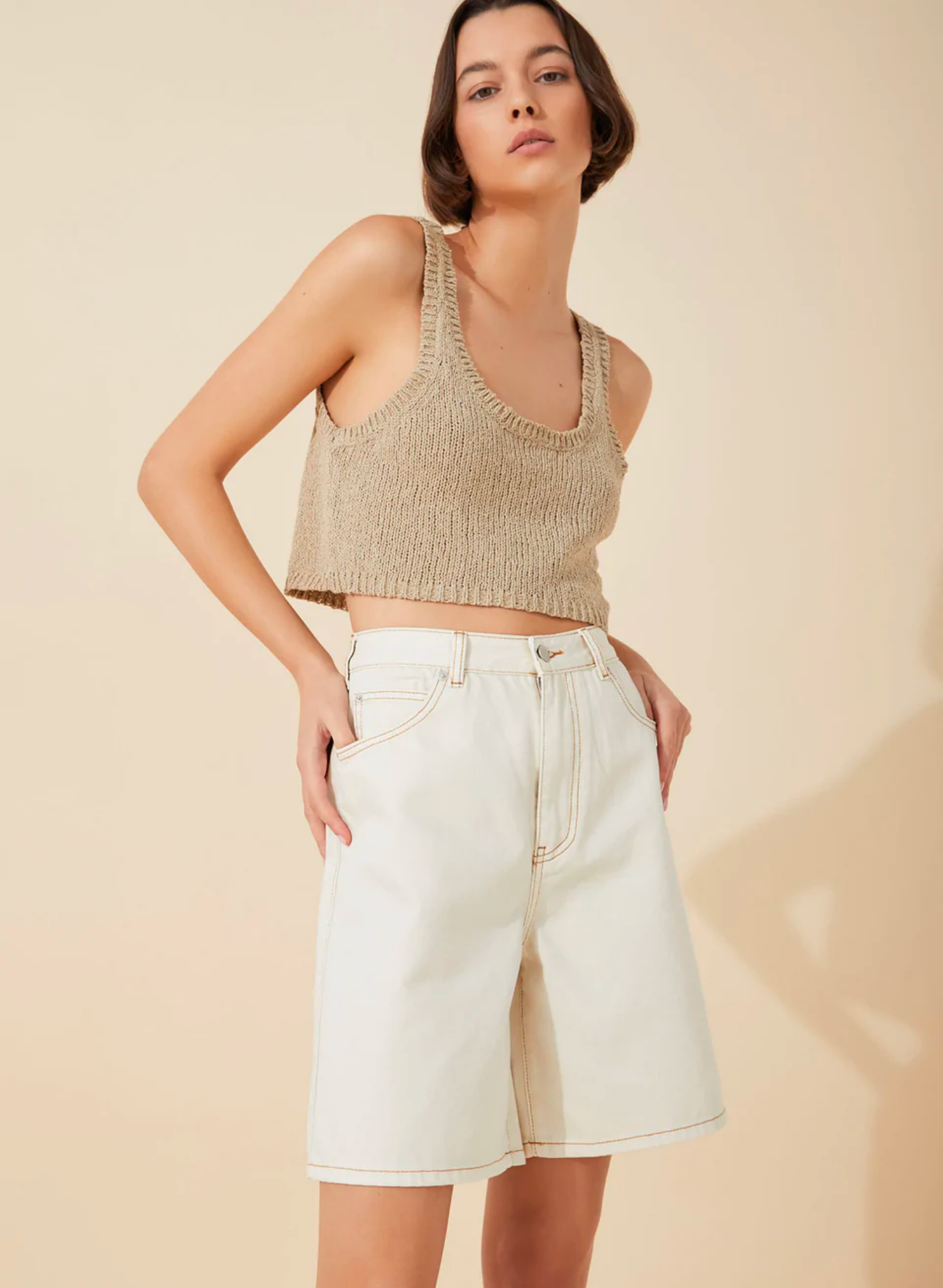 The Husk Textured Cotton Blend Knit Tank by Zulu & Zephyr is spun from a boucle textured, BCI-certified cotton blend yarn. Featuring a scoop neckline and loose cut, this piece is a wardrobe staple that can be styled with a myriad of looks.